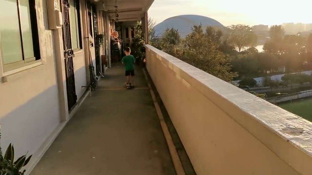 Evening light along an HDB corridor in Singapore